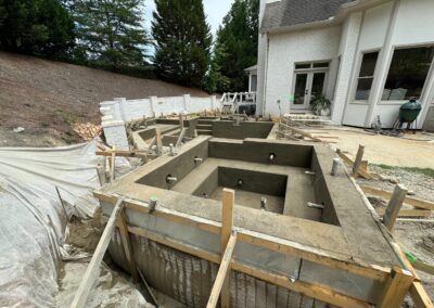 Pool under construction, concrete shell with timber formwork in place